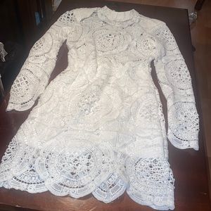 White long sleeves dress crochet style. Beautiful.